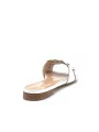 White leather mule with intertwined band. Leather lining, leather sole. 1 cm hee