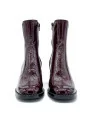 Bordeaux patent leather with creased effect boot. Leather lining, rubber sole. 6
