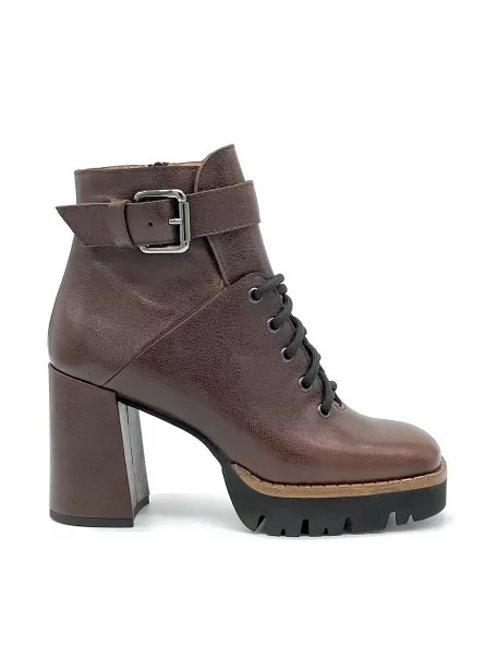 Brown leather biker. Leather lining, rubber sole. 9 cm heel.