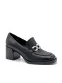 Black leather mocassin with metal buckle. Leather lining, rubber sole. 6 cm heel