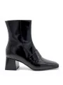 Black leather boot. Leather lining, leather and rubber sole. 6 cm heel.