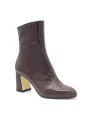 Brown leather boot. Leather lining, leather and rubber sole. 7,5 cm heel.