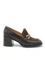 Brown printed leather and suede moccasin with metal buckle. Leather lining, rubb