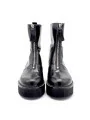 Black leather boot with zipper. Leather lining, rubber sole. 5,5 cm heel.