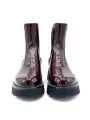 Bordeaux patent leather with creased effect beatle. Leather lining, rubber sole.