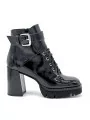 Black patent leather with creased effect biker. Leather lining, rubber sole. 9 c