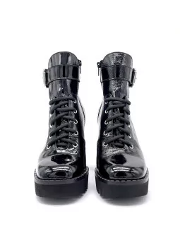 Black patent leather with creased effect biker. Leather lining, rubber sole. 9 c
