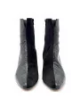 Black suede and printed leather boot. Leather lining, leather and rubber sole. 5