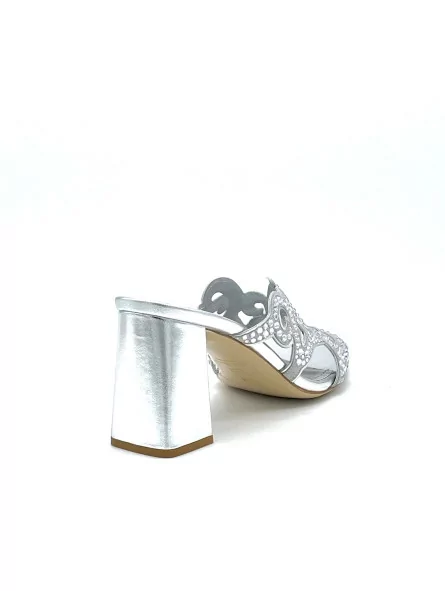 Silver laminate leather and suede mule with rhinestones detail. Leather lining, 
