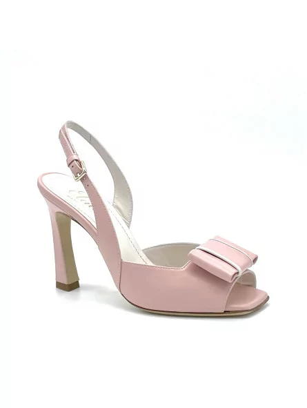Pink leather sandal with bow. Leather lining. Leather sole. 9,5 cm heel.