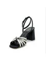 100% black silk and gold laminate leather sandal with knotted bands. Leather lin