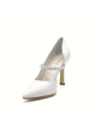 Cream colour leather pump with rhinestones detail. Leather lining. Leather sole.