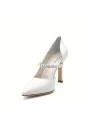 Cream colour leather pump with rhinestones detail. Leather lining. Leather sole.