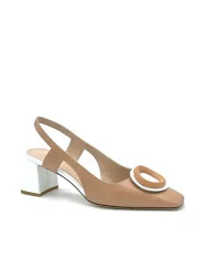 Tan and white leather slingback with matching “circle” accessory. Leather li