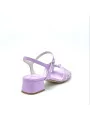 Lavender and white leather sandal with knotted bands. Leather lining. Leather so