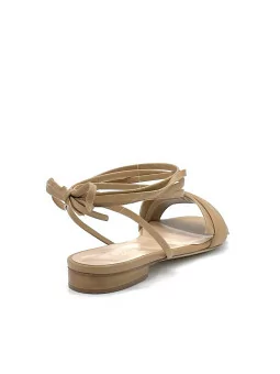 Tan leather sandal with laces. Leather lining. Leather sole. 1 cm heel.
