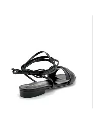 Black leather sandal with laces. Leather lining. Leather sole. 1 cm heel.