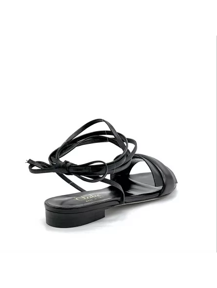 Black leather sandal with laces. Leather lining. Leather sole. 1 cm heel.