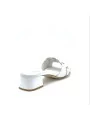 White leather mule with intertwined band. Leather lining. Leather sole. 3,5 cm h