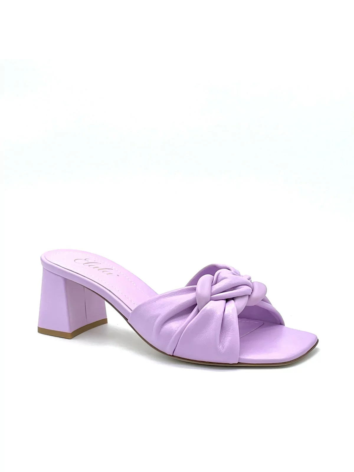 Lavender leather mule with matching accessory. Leather lining. Leather sole. 5,5