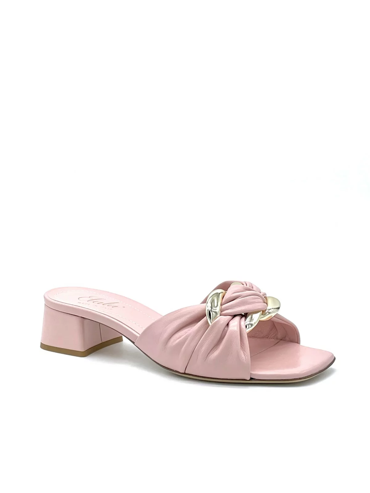 Pink leather mule with golden accessory. Leather lining. Leather sole. 3,5 cm he