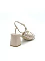 Nude colour patent leather sandal with silver chain. Leather lining. Leather sol
