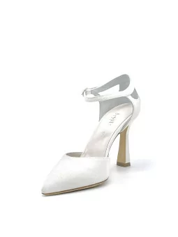 White laminate fabric D’orsay with ankle strap. Leather lining. Leather sole. 