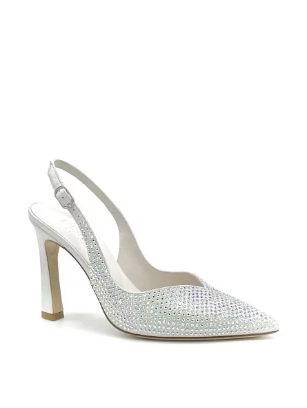White/silver laminate suede slingback with iridescent rhinestones. Leather linin