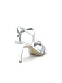 Silver laminate leather and silver fabric sandal with ankle strap. Leather linin