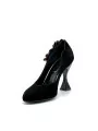 Black suede pump with black patent and Bordeaux velvet flower accessory with stu