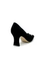 Black suede pumps with gold metal bow accessory. Leather lining, leather sole. 7