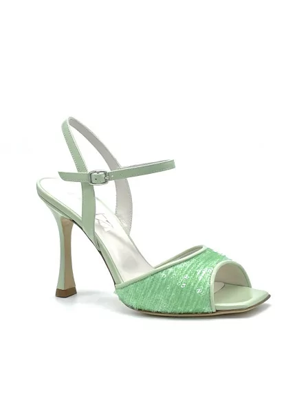 Green leather and paillettes sandal. Leather lining, leather sole 9,5 cm heel.