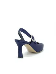 Blue silk slingback with jewel buckle. Leather lining, leather sole. 7,5 cm heel