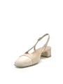 Nude leather and patent slingback. Leather lining, leather sole. 3,5 cm heel.