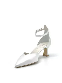 White pearl leather D’orsay with ankle strap. Leather lining, leather sole. 5,