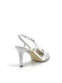 White silk slingback with laminate fabric details. Leather lining, leather sole 