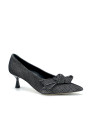 Printed suede pump with bow. Leather lining, leather and rubber sole. 5,5 cm hee