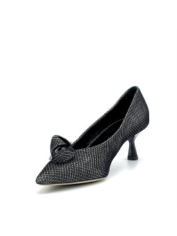 Printed suede pump with bow. Leather lining, leather and rubber sole. 5,5 cm hee