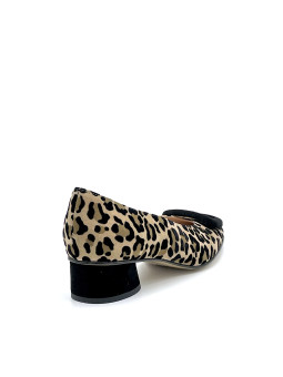 Printed suede pump with black suede buckle. Leather lining, leather and rubber s