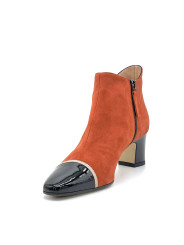 Pumpkin suede and black patent boots with beige grosgrain ribbon. Leather lining