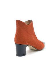 Pumpkin suede and black patent boots with beige grosgrain ribbon. Leather lining