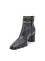 Black leather and beige tweed fabric boots with buckle. Leather lining, leather 