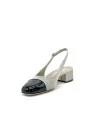 Slingback in tessuto nido d’ape beige e vernice nera. Fodera in pelle, suola i