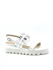 White patent sandal with black and white vinyl. Leather lining, patent covered w