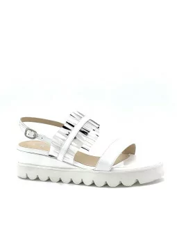 White patent sandal with black and white vinyl. Leather lining, patent covered w