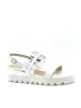 White patent sandal with black and white vinyl. Leather lining, patent covered w