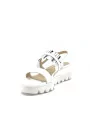 White patent sandal with black and white vinyl. Leather lining, patent covered w