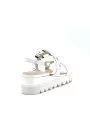 White patent sandal with black and white vinyl. Leather lining, patent covered w