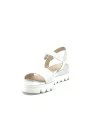 Milk leather sandal with jewel buckle. Leather lining, leather covered wedge and