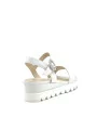 Milk leather sandal with jewel buckle. Leather lining, leather covered wedge and